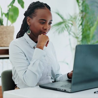 Childcare director working on computer